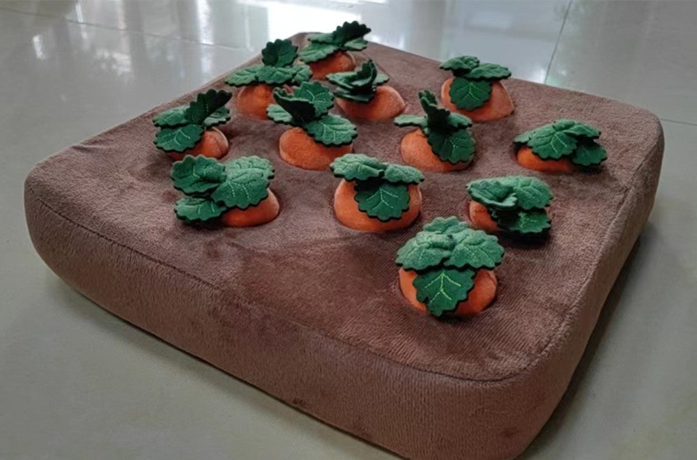 Removable plush carrots in the snuffle garden